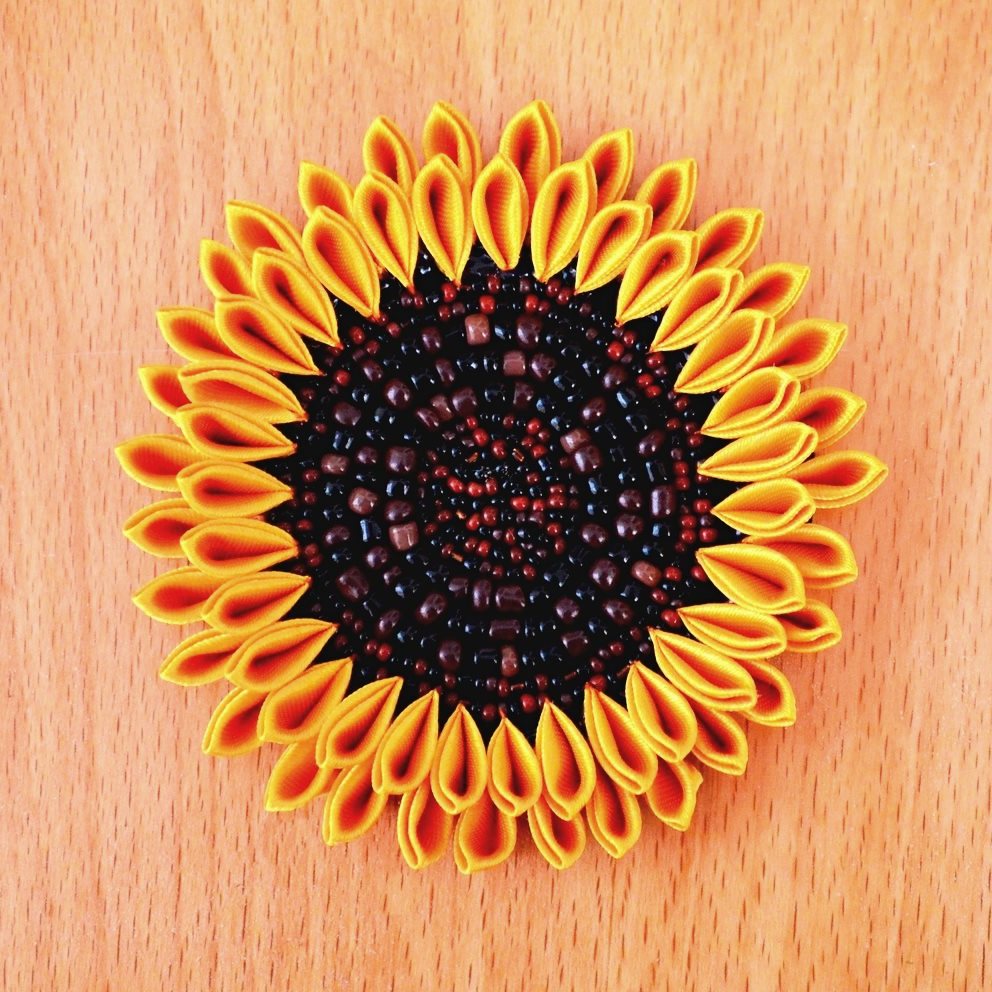 Large sunflower with brown and black seed beads embroidery